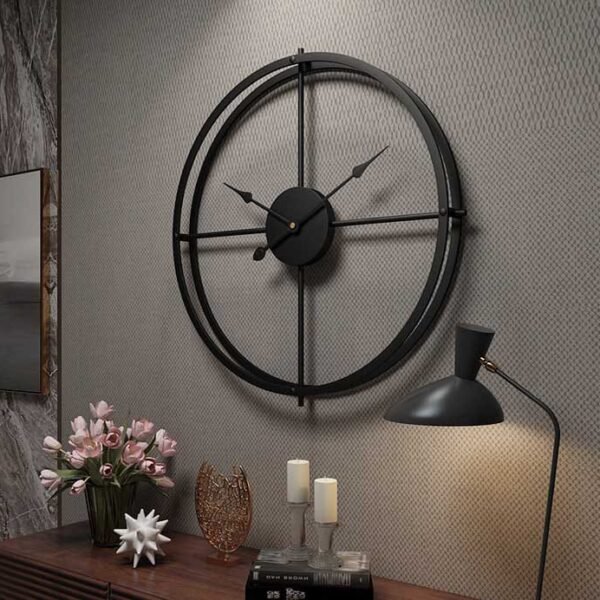 24-inch black metal wall clock with a vintage pattern, featuring classic elegance and designed to complement contemporary and modern home decor."