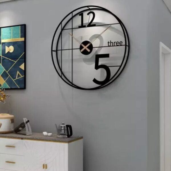 24-inch black metal wall clock with a vintage pattern, featuring classic elegance and designed to complement contemporary and modern home decor."