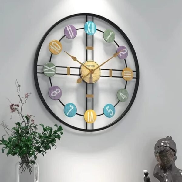 24-inch black metal wall clock with a vintage pattern, featuring classic elegance and designed to complement contemporary and modern home decor."